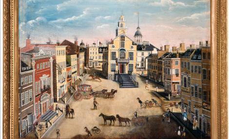 portrait showing a city street with tall building on the edges and people on horses and in carriages crossing the open dirt path in the middle